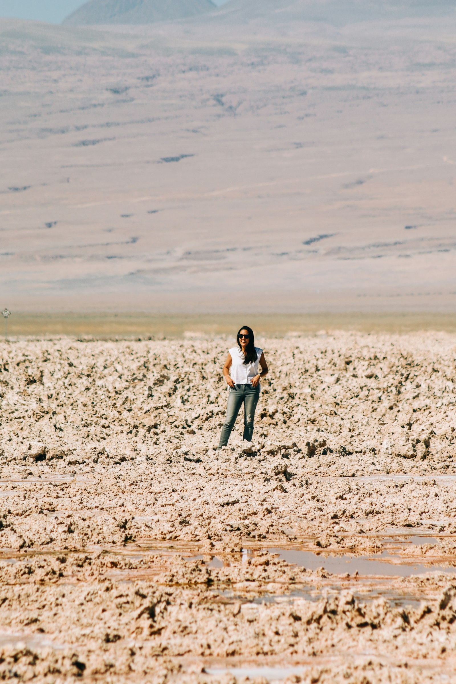 Canon EOS 70D + Canon EF 75-300mm f/4-5.6 sample photo. Woman standing on mud photography