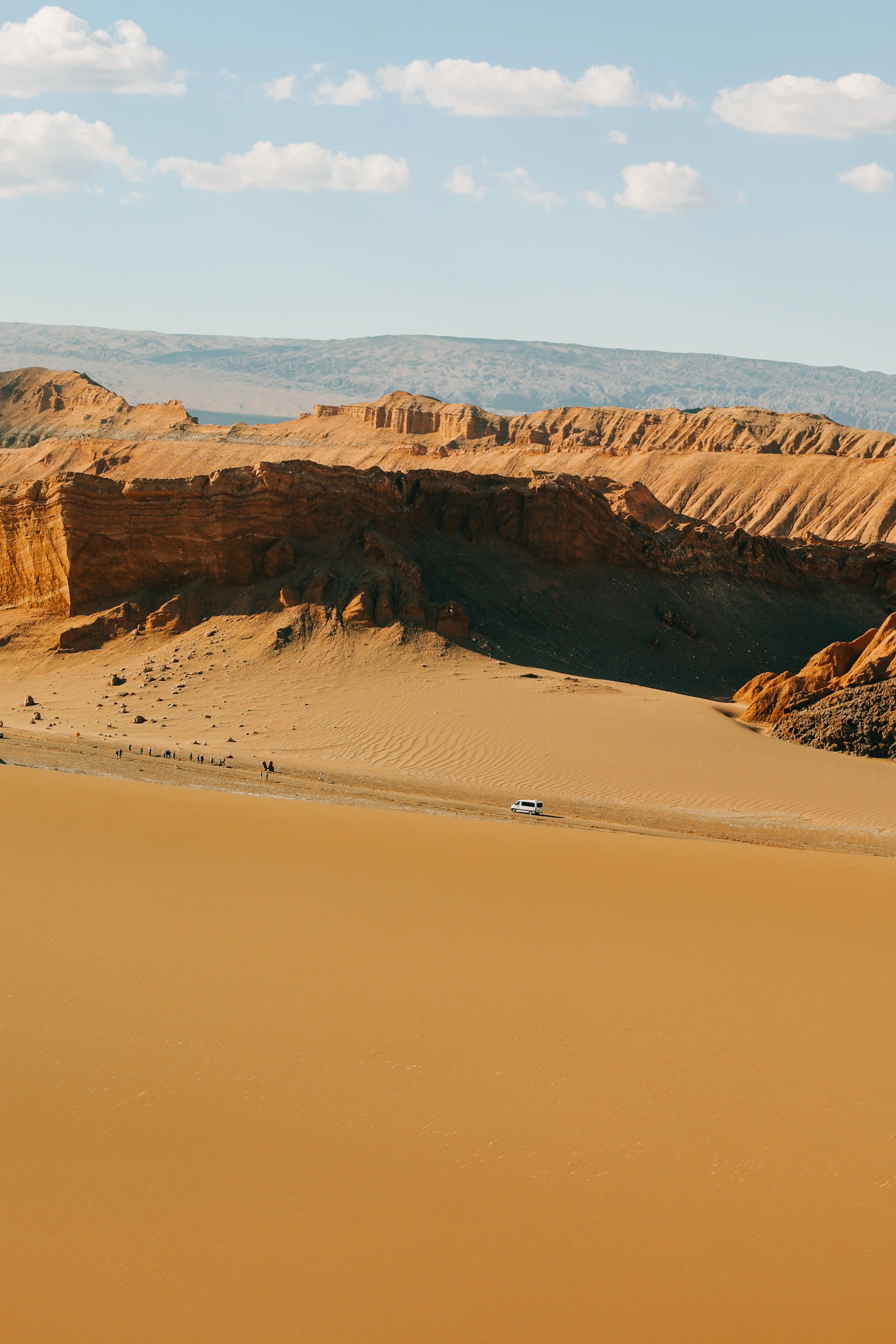Atacama desert with ancient sand dunes and perfectly clear horizon under an intense blue sky
