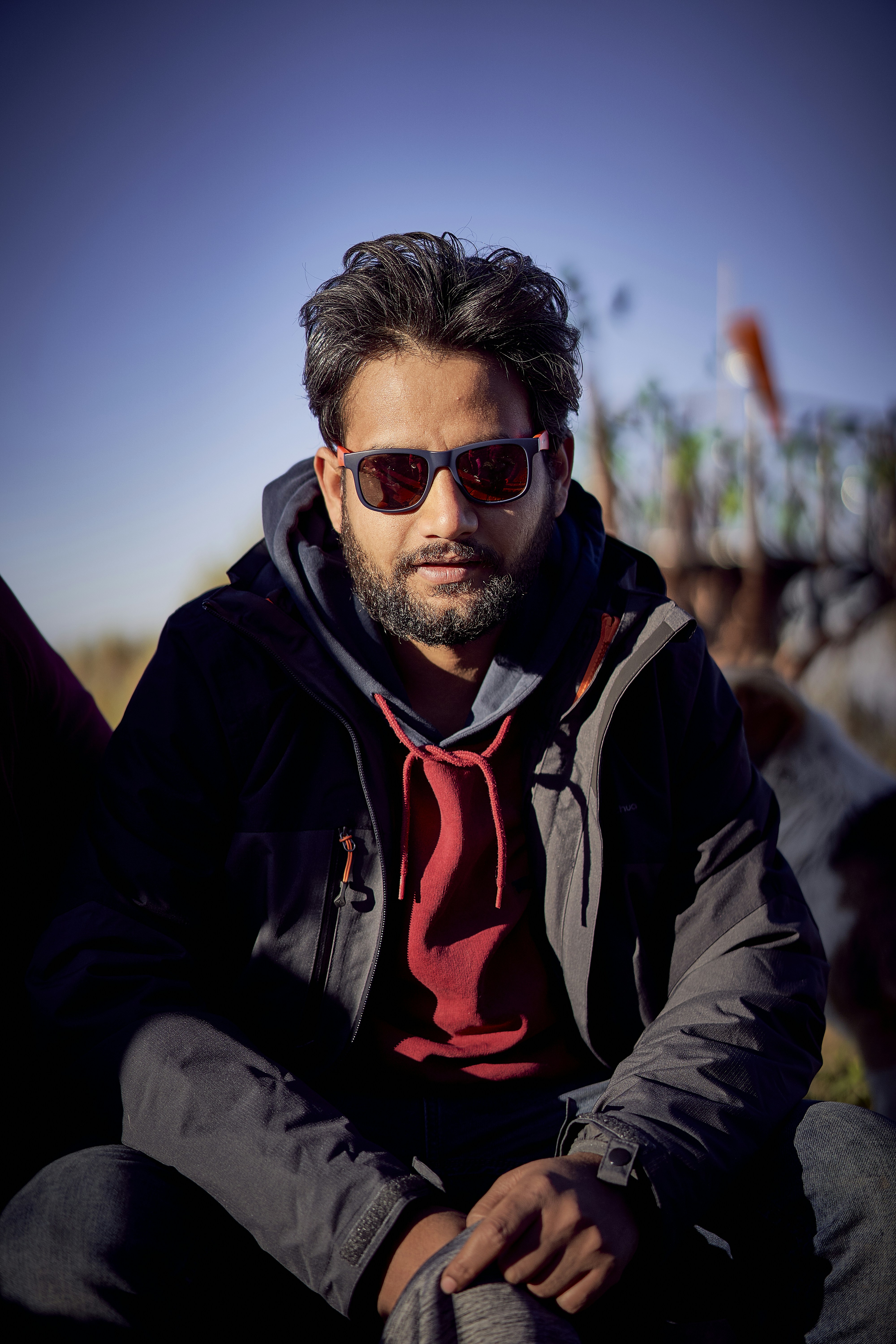 man in sunglasses and black jacket