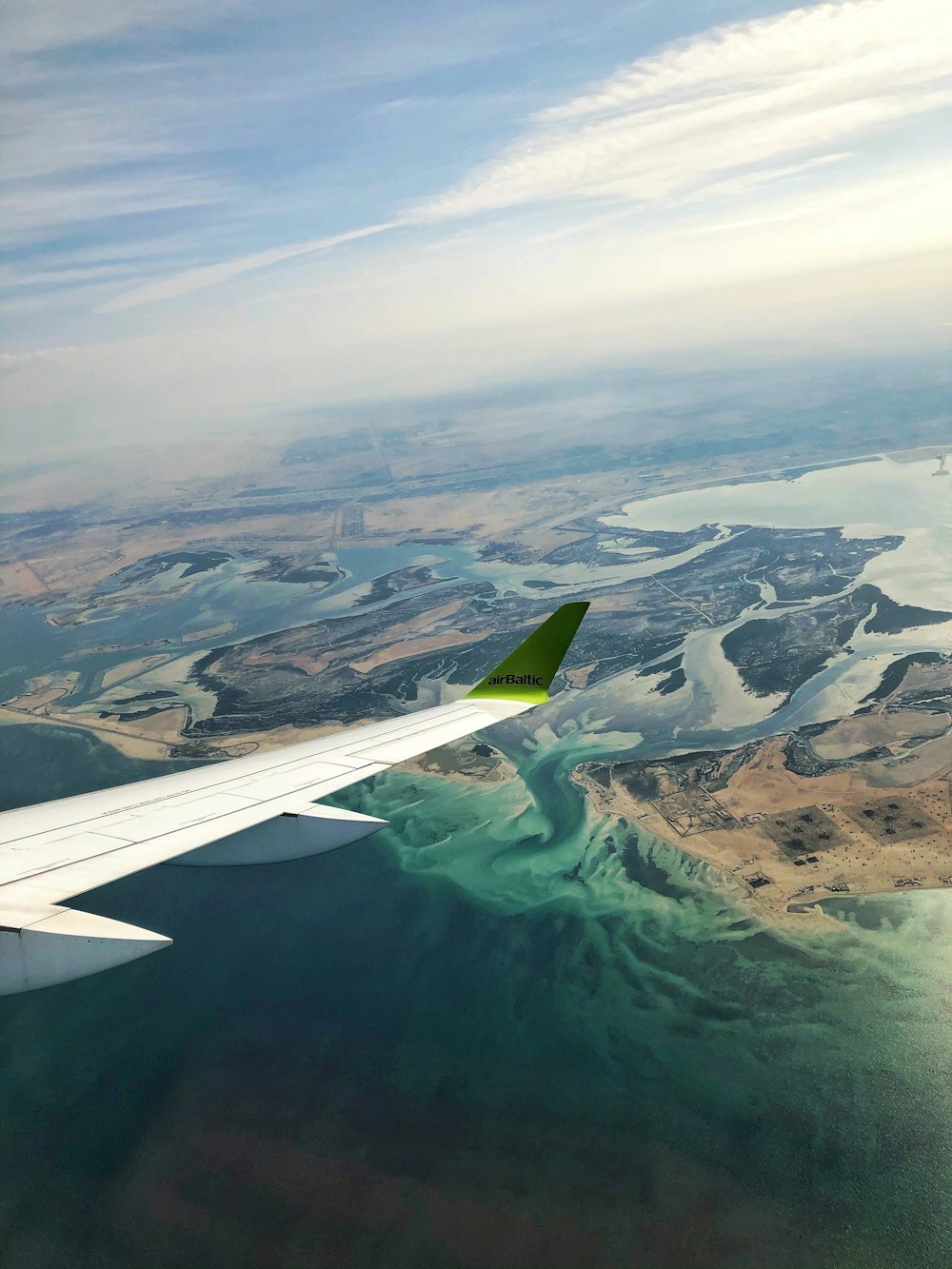 plane over body of water