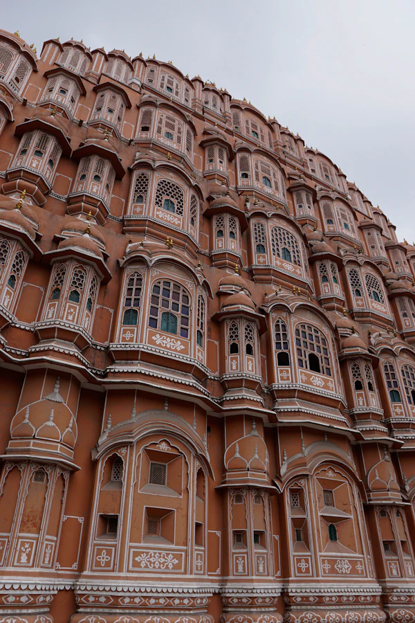 Hawa Mahal wind palace facade in Jaipur — budget caravan rental Rajasthan