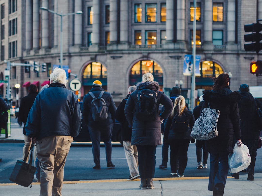 shallow focus photo of people in street during daytime