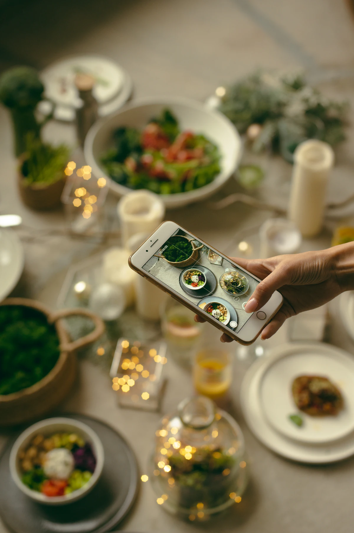 A patient photographing their meal with a smartphone