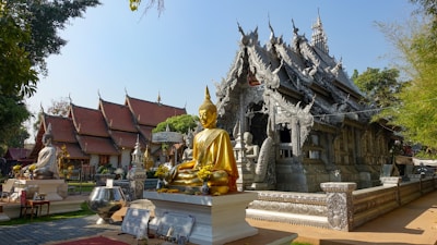 shallow focus photo of Gautama Buddha statue