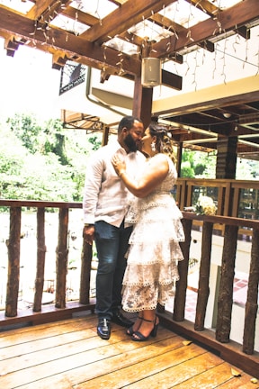 Elegant couple enjoying a private dinner under twinkling lights in a Bali resort.