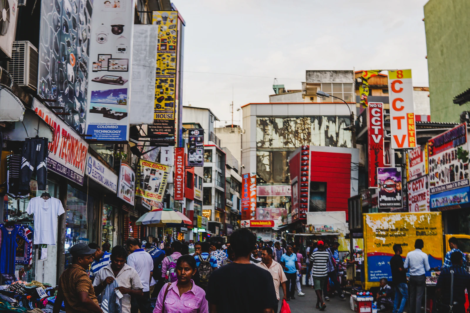 People walking inside a flea market in Sri Lanka
