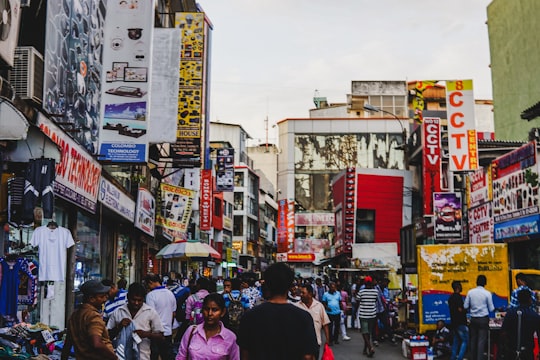 people walking inside flea market in Pettah Sri Lanka