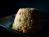 fried rice on ceramic plate