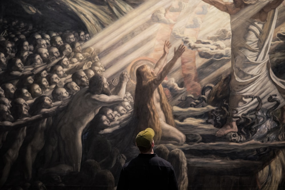 man watching Christ in the Realm of the Dead painting
