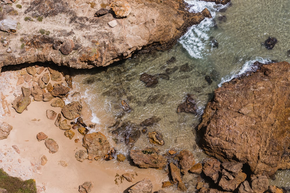 aerial view of boulders and sea