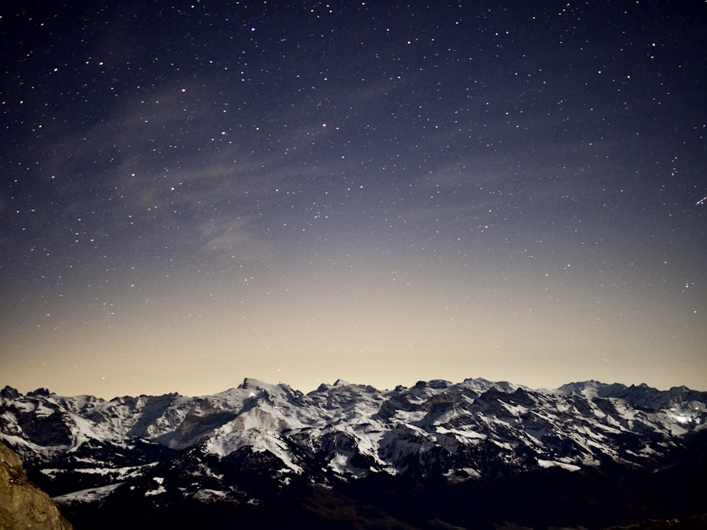 mountains under starry night
