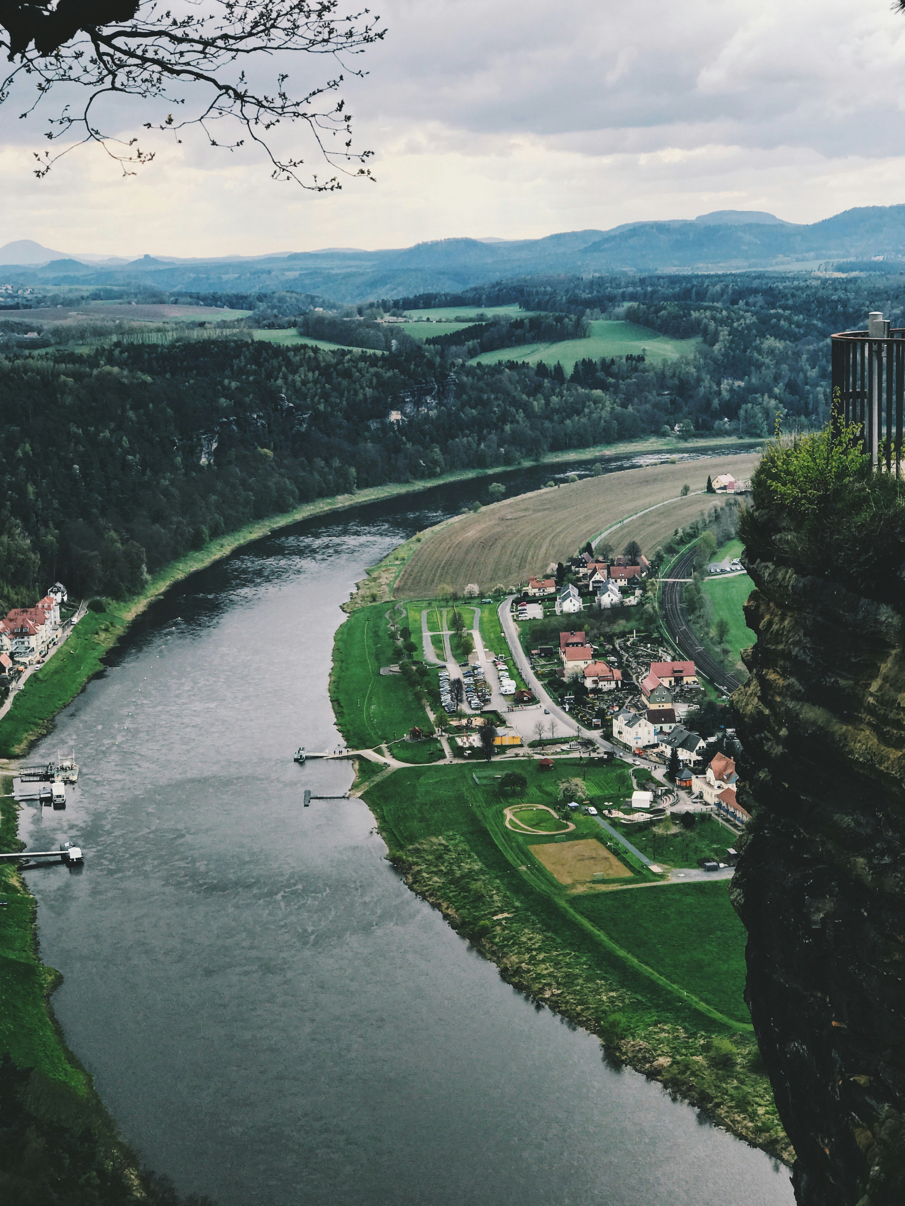 river in forest near village