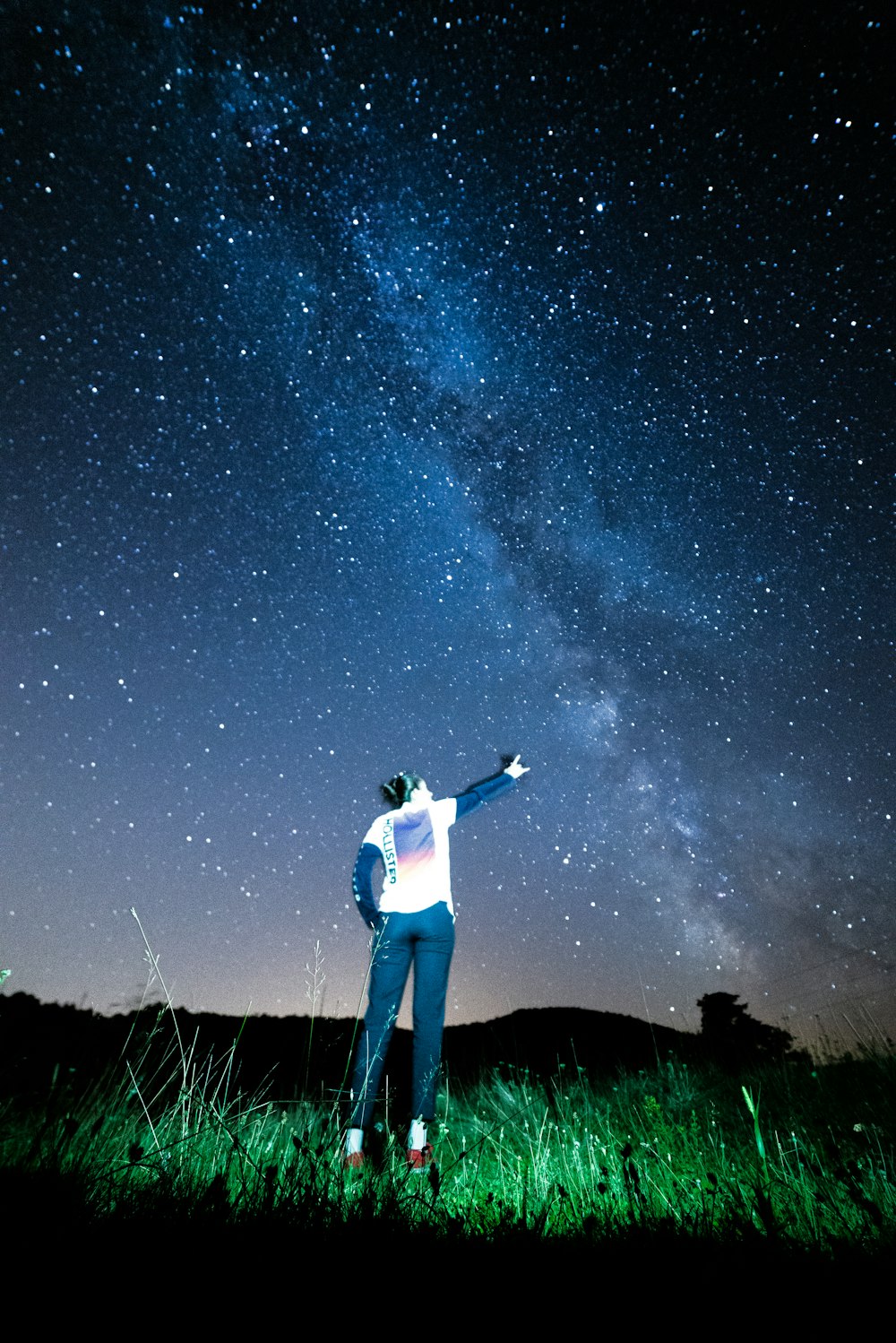 woman watching milky way