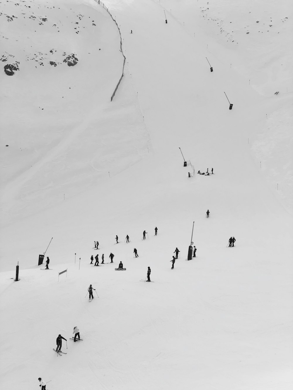 snowboarders on snow hill