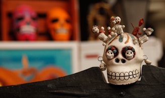 selective focus photography of a white skull figurine