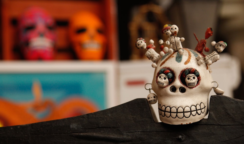 selective focus photography of a white skull figurine