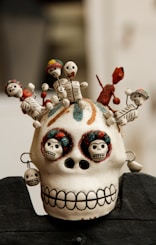 white and multicolored skull miniature