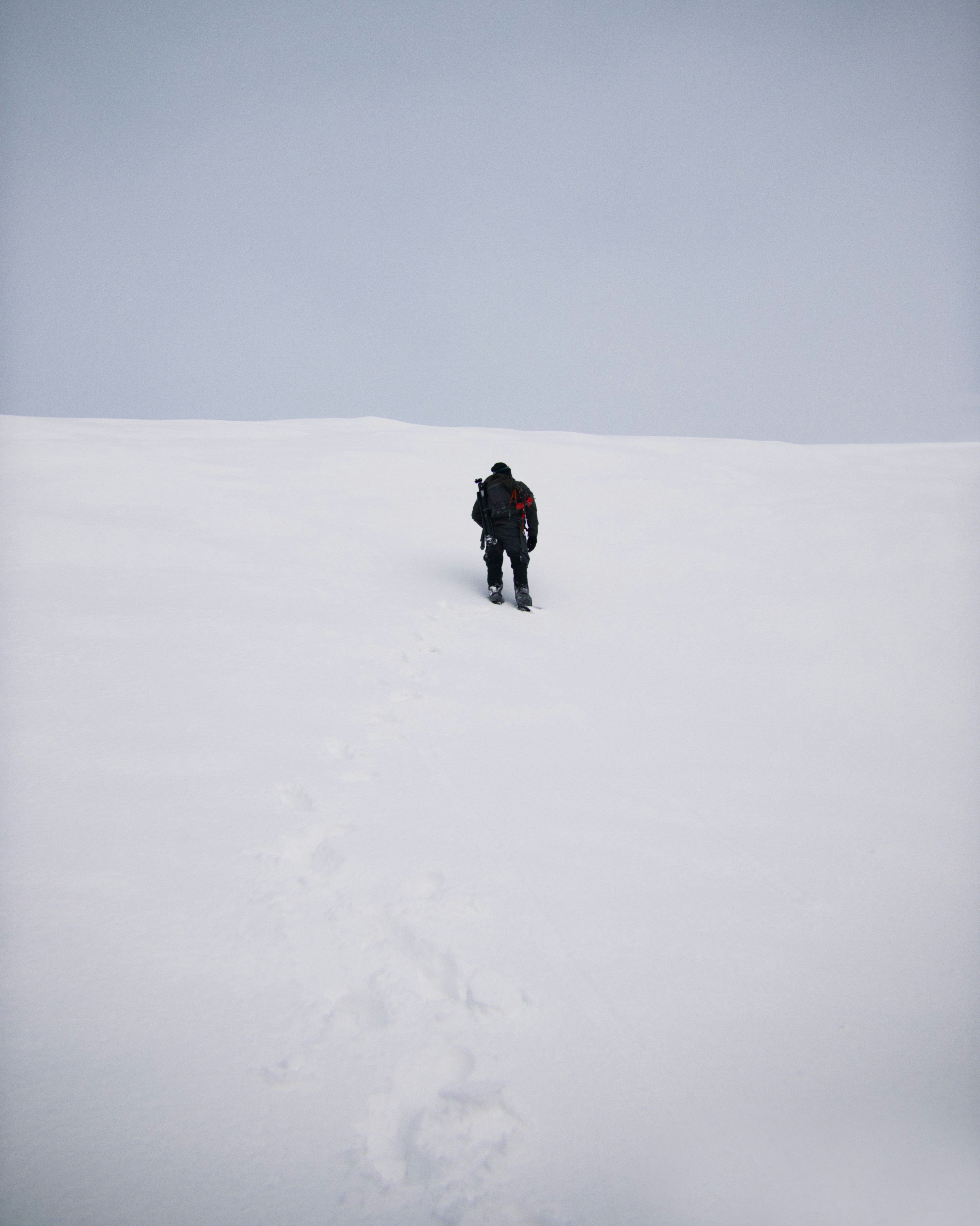 person in snowfield during daytime