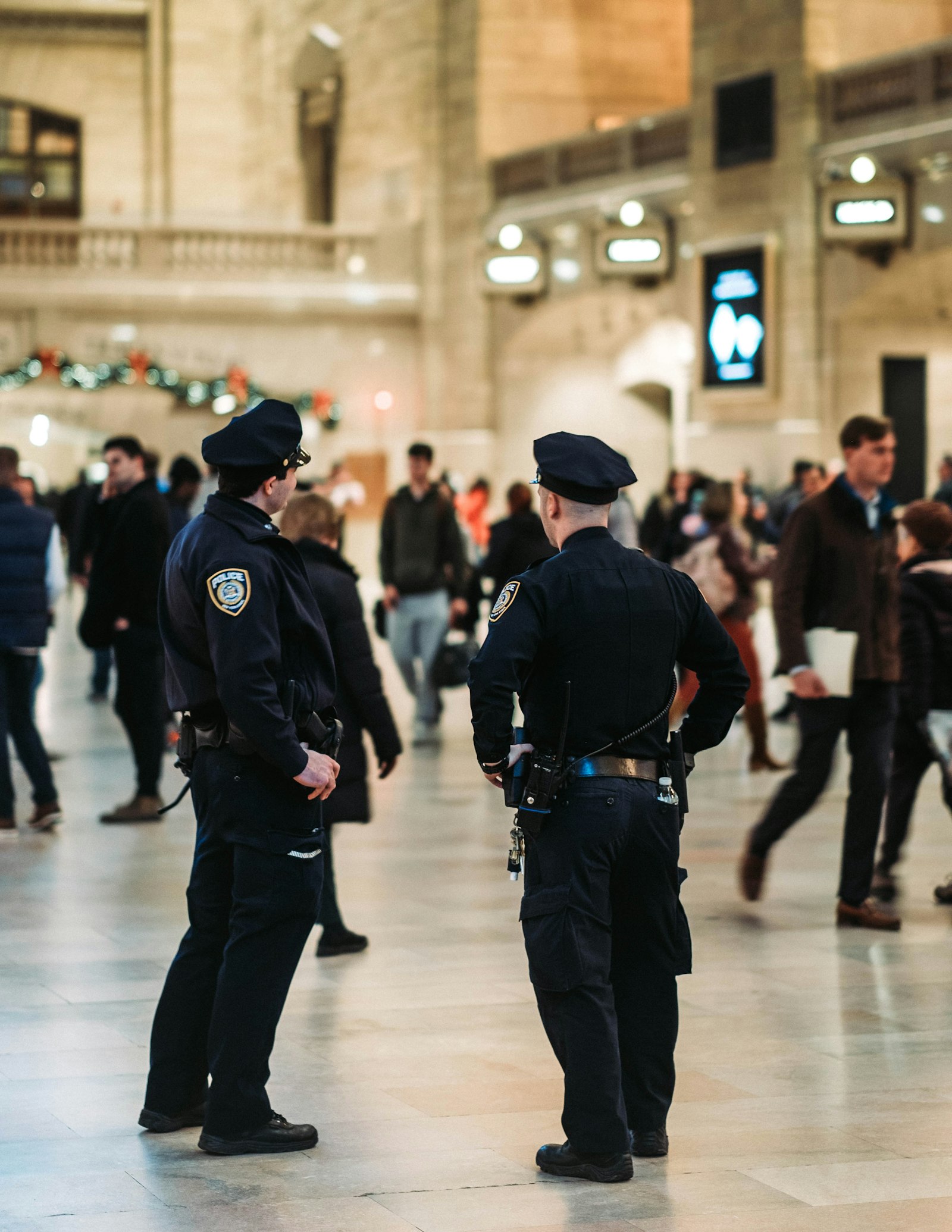 Fujifilm X-T10 + Fujifilm XF 56mm F1.2 R sample photo. Police officers in station photography