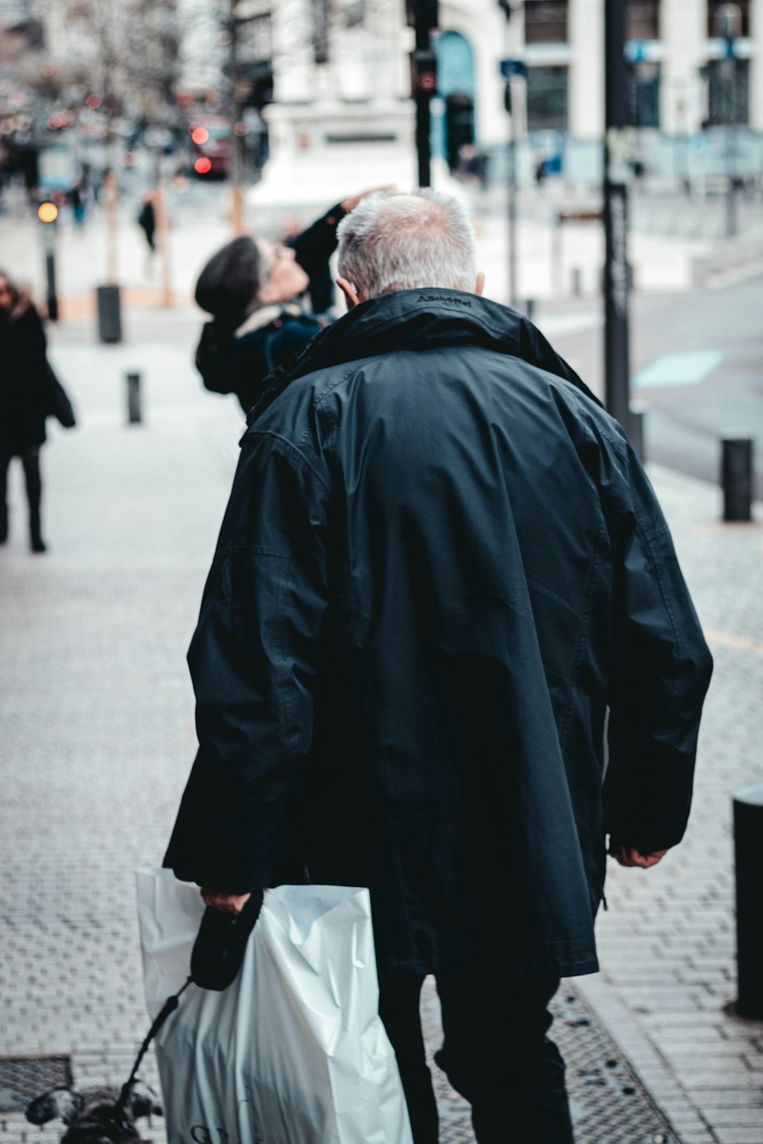 man wearing black jacket