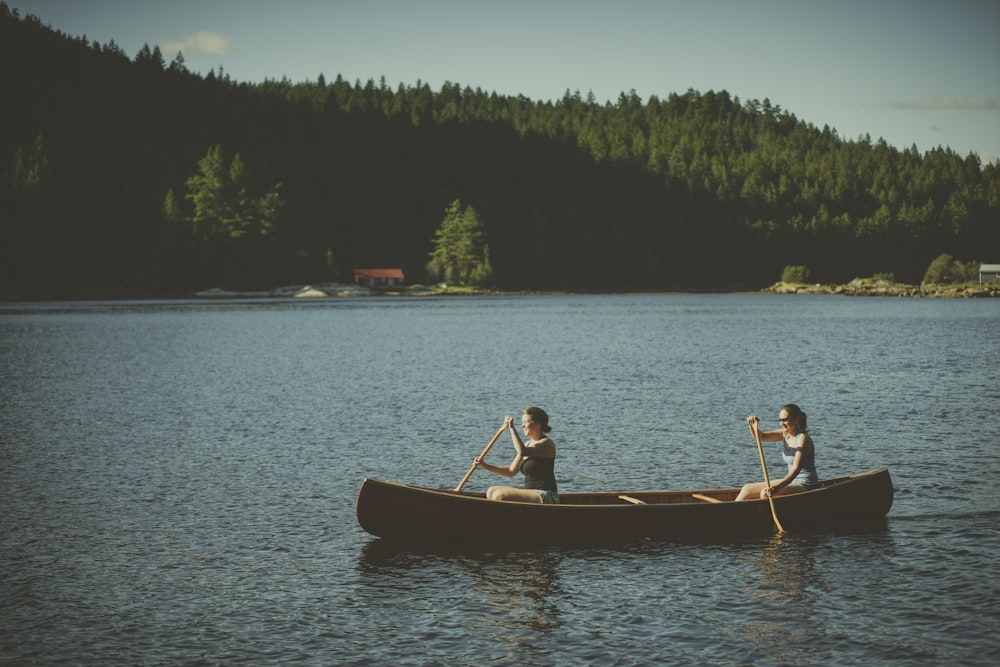 two persons on boat