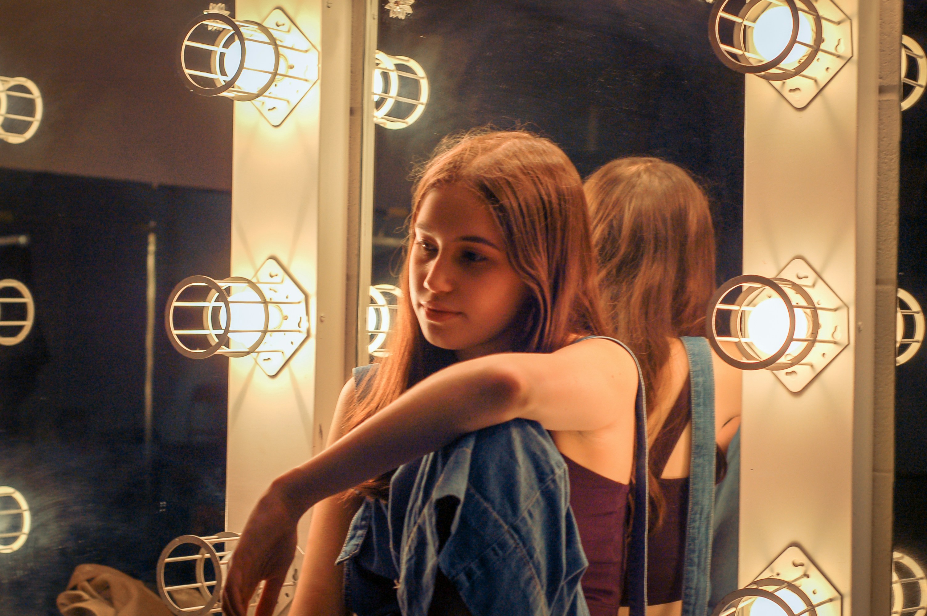 woman on vanity mirror