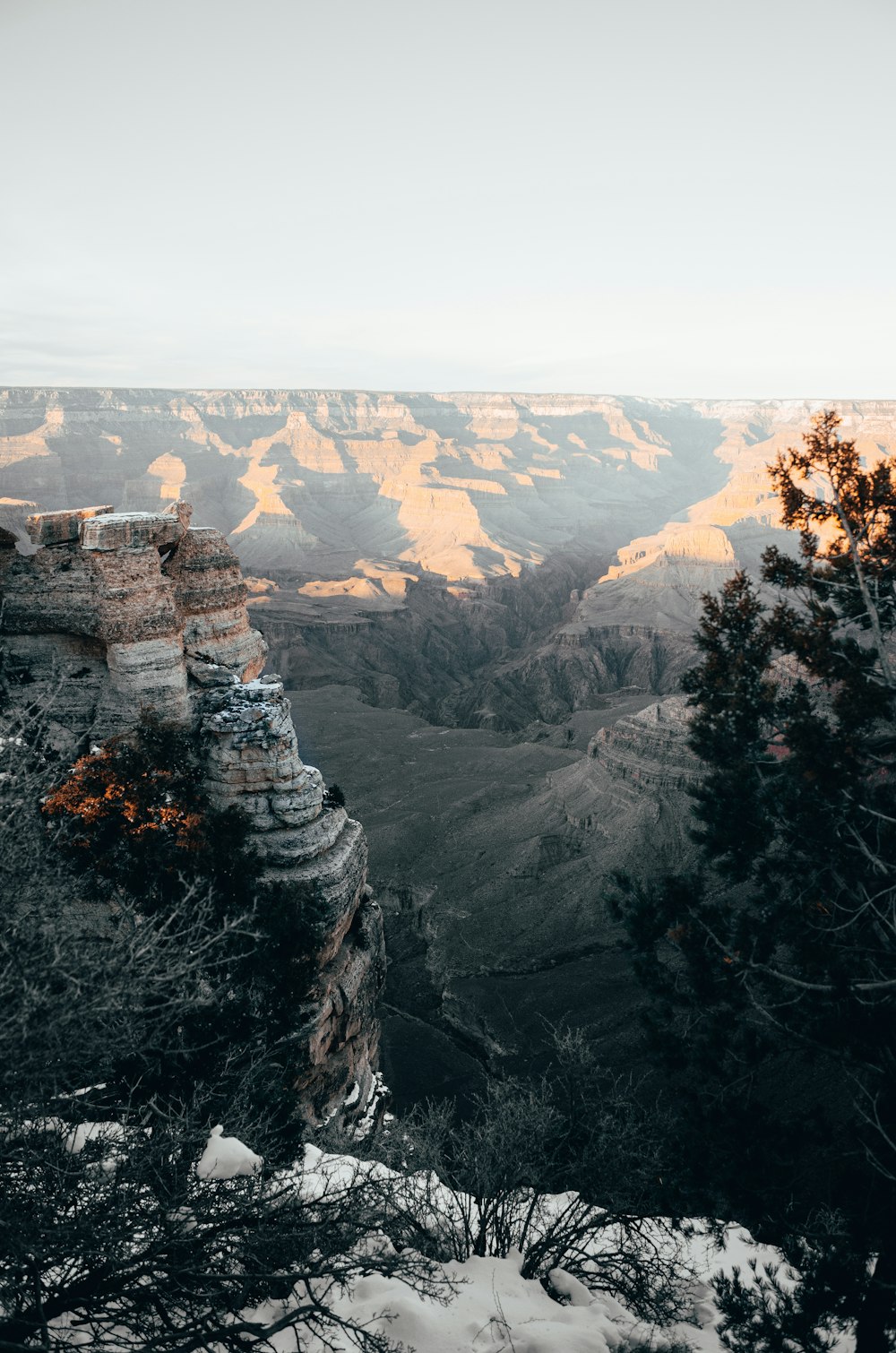 badlands under white sky