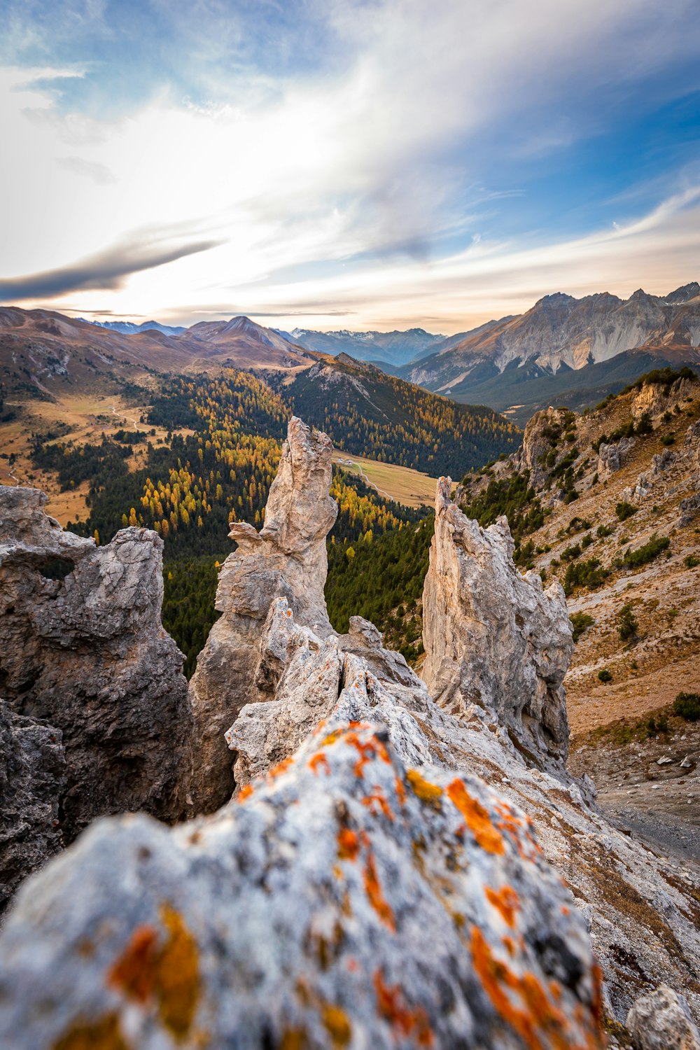 aerial photography of mountains under a calm blue sky