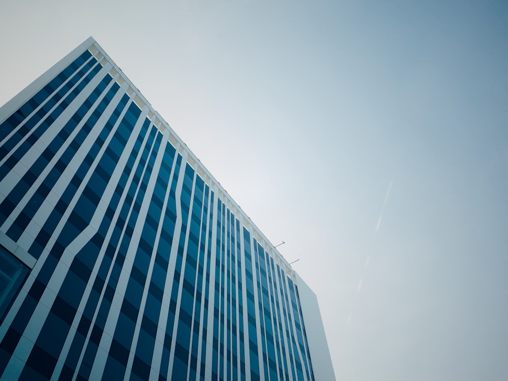 curtain wall high-rise building during daytime