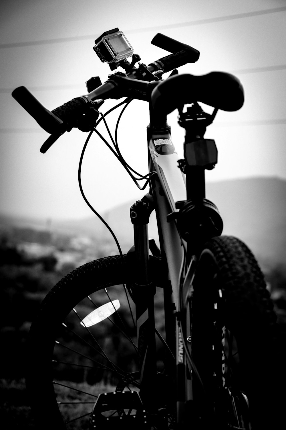 grayscale photo of bike
