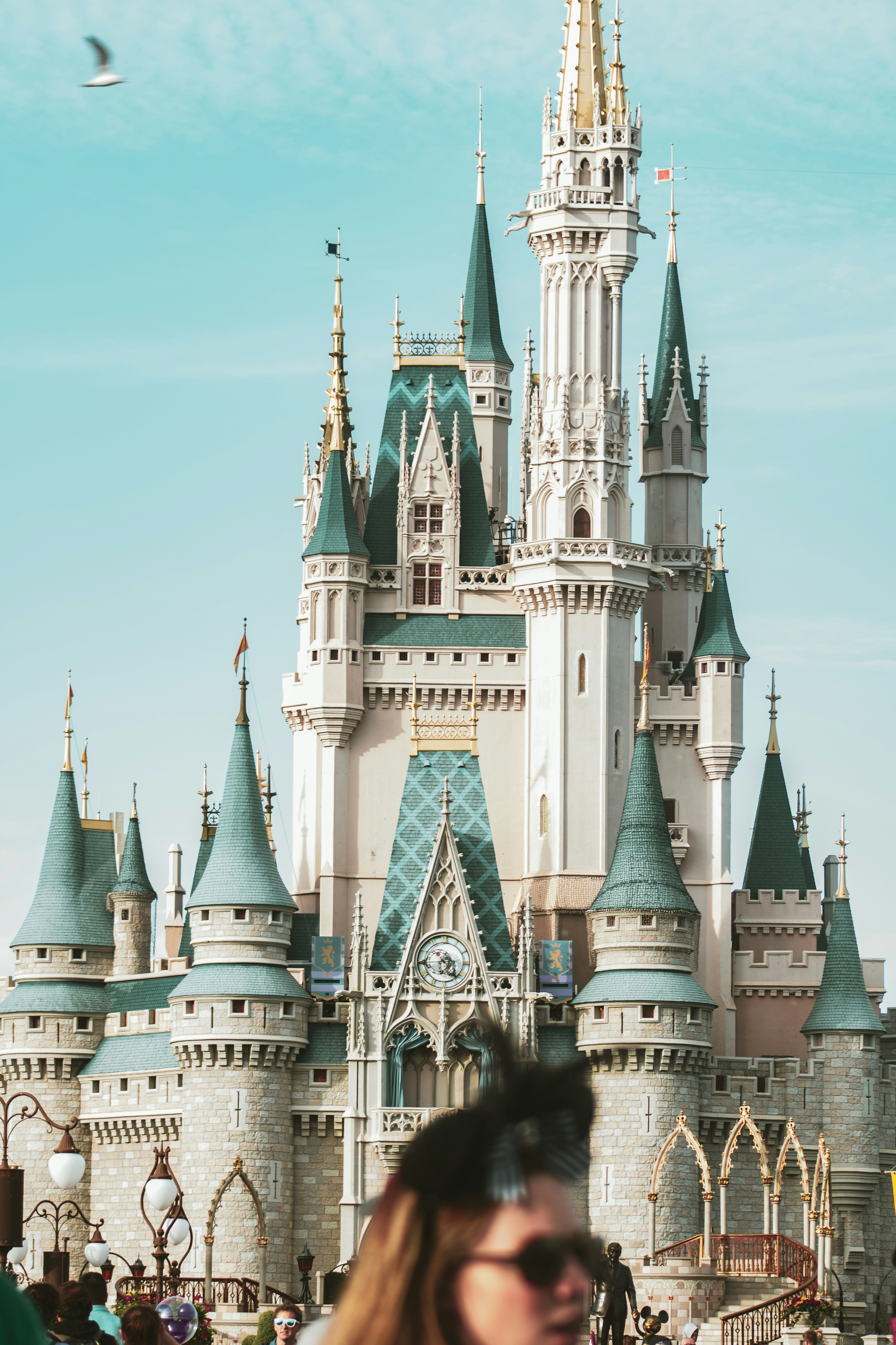 Pastel pink and blue Cinderella Castle, Disney World during the day