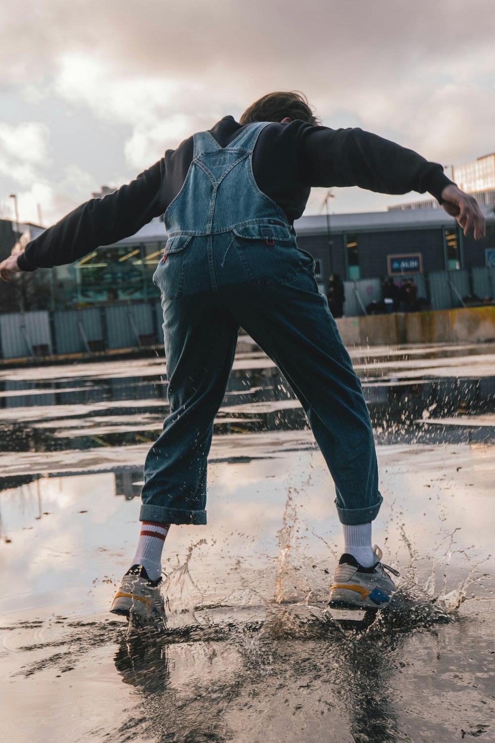 man in overall jeans