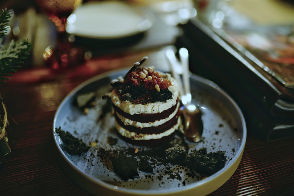 cake beside spoon on cake tray