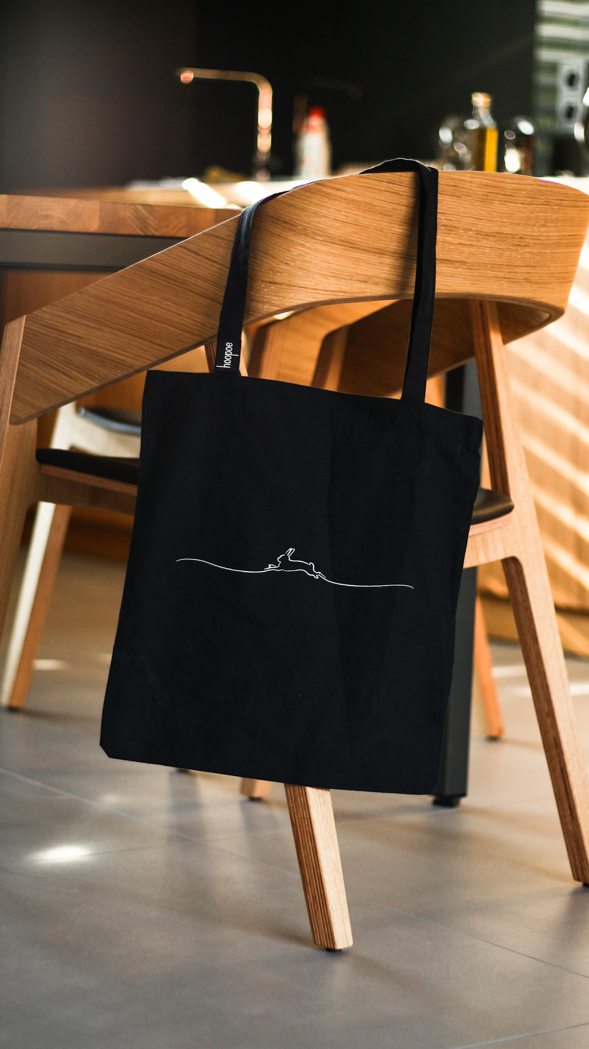 A black leather tote bag