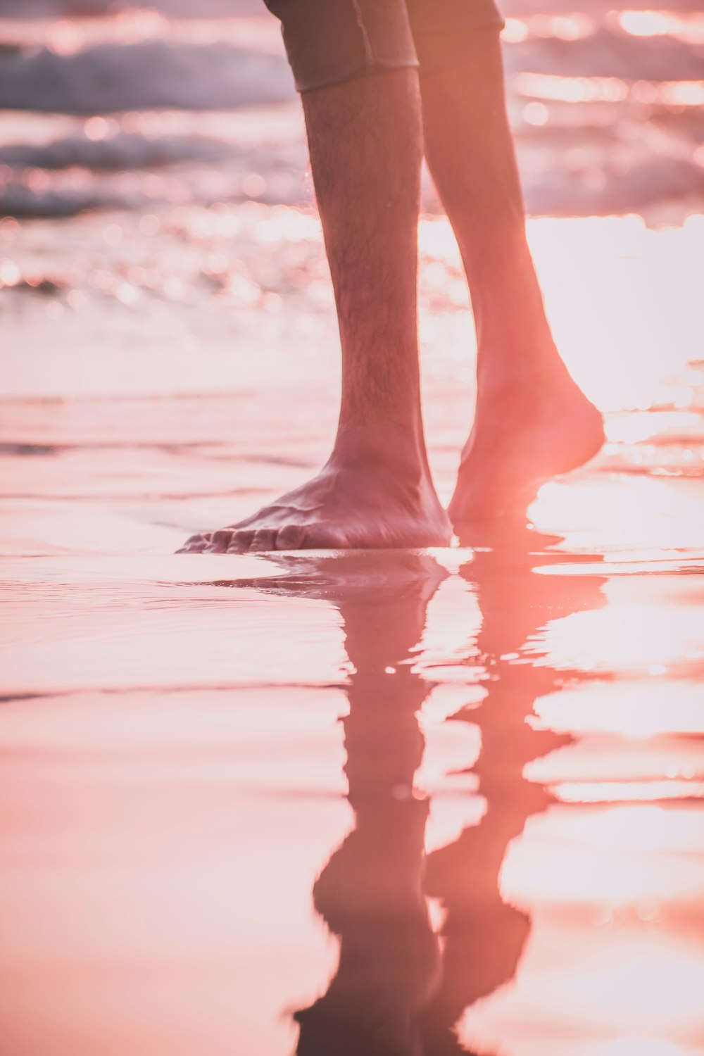 shallow focus photo of person's feet