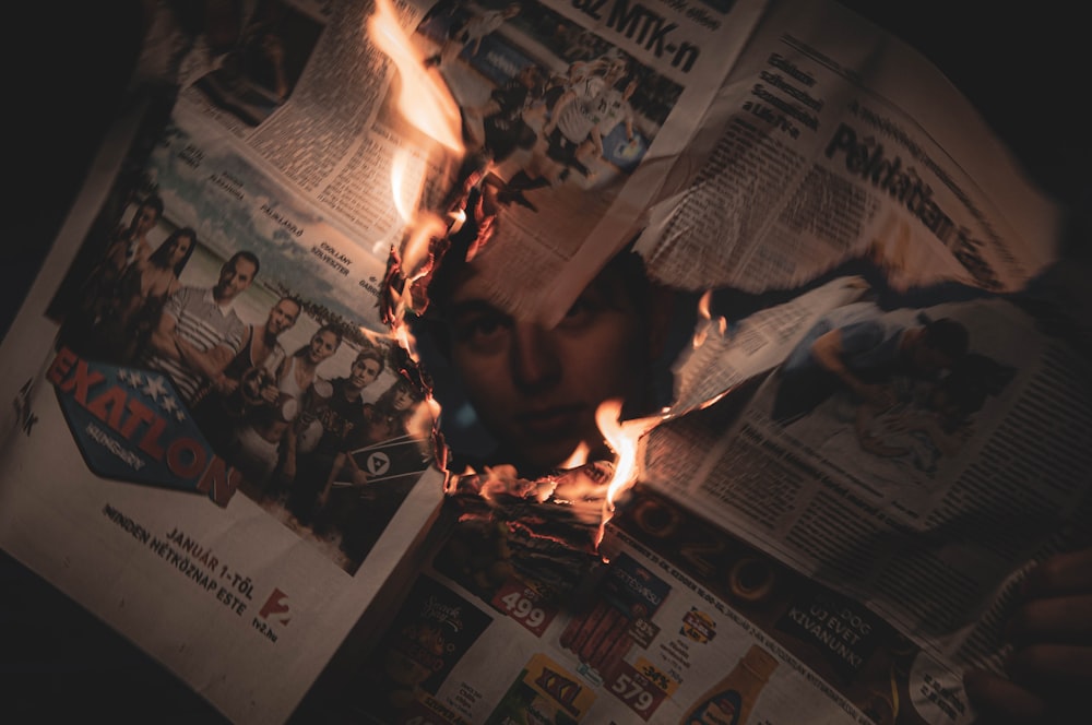 burning newspaper page
