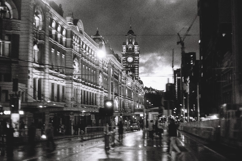 grayscale photography of buildings during nighttime