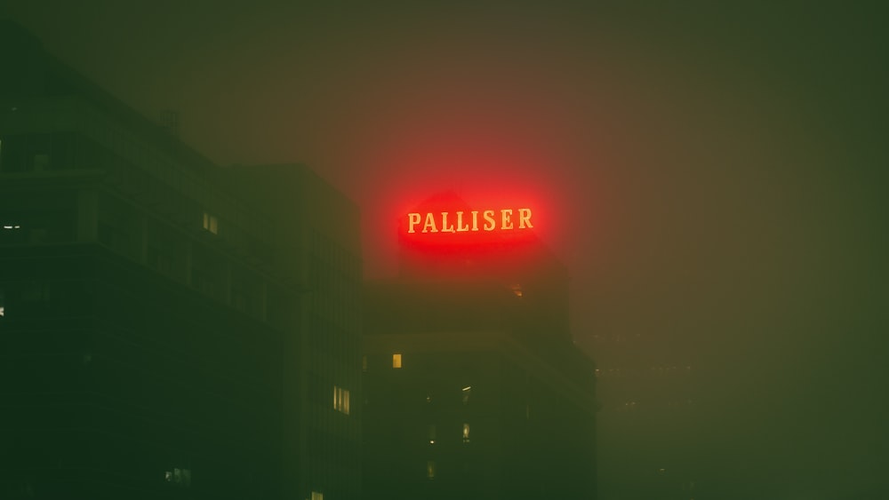Palliser neon signage during nighttime