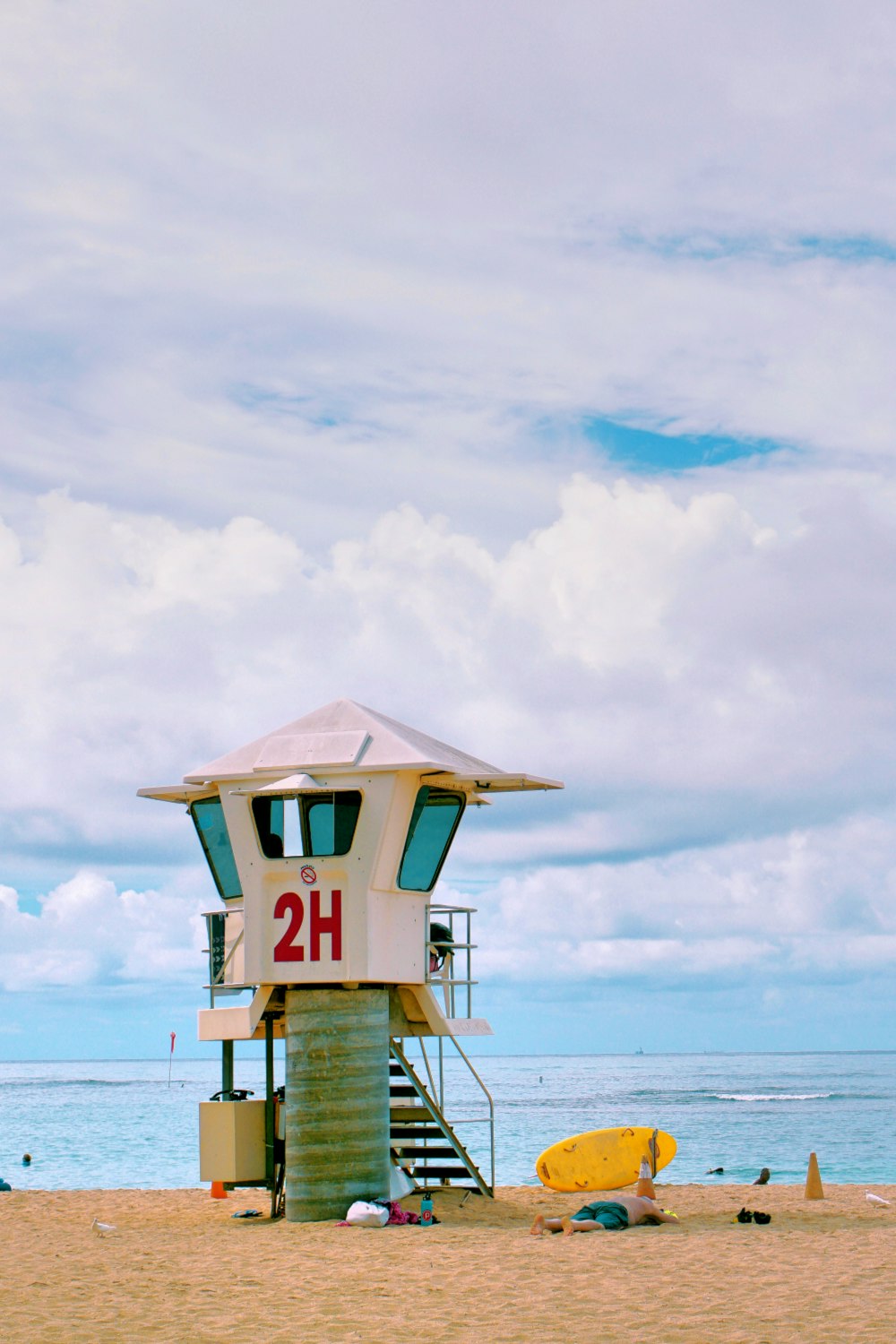 white and blue life guard house