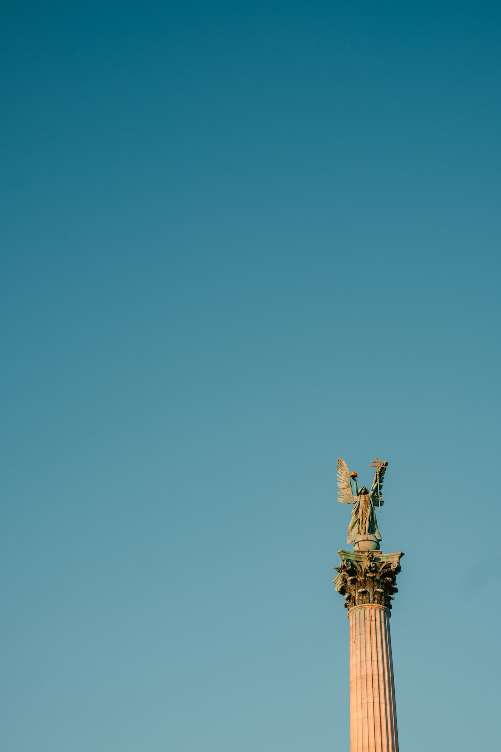 female angel standing statue