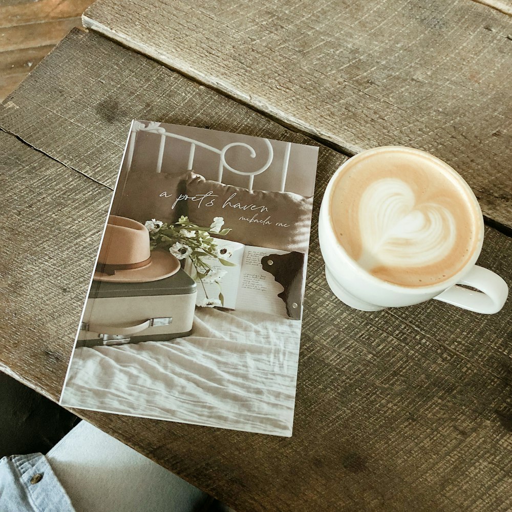 white ceramic cup filled with cappuccino