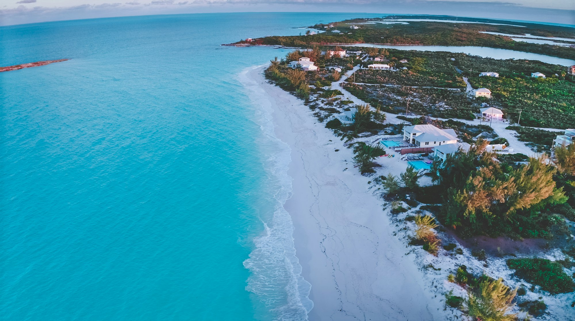 Ocean, white sand, Tropic of Cancer Beach at the Exuma, Bahamas, Photo by Pritam Pebam / Unsplash