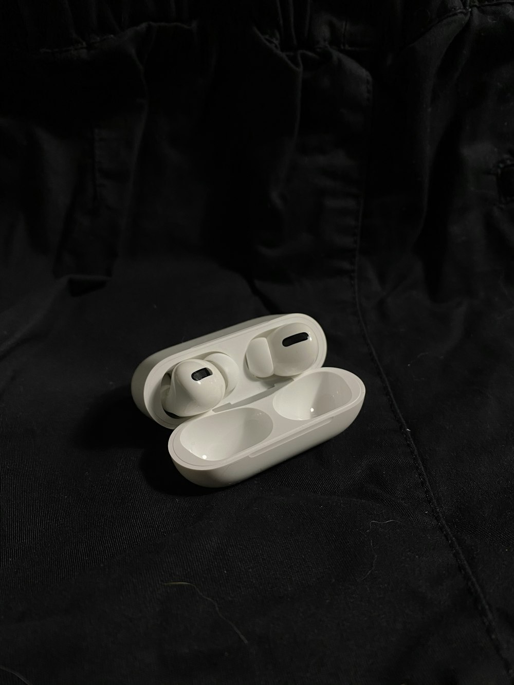 pair of white wireless earphones