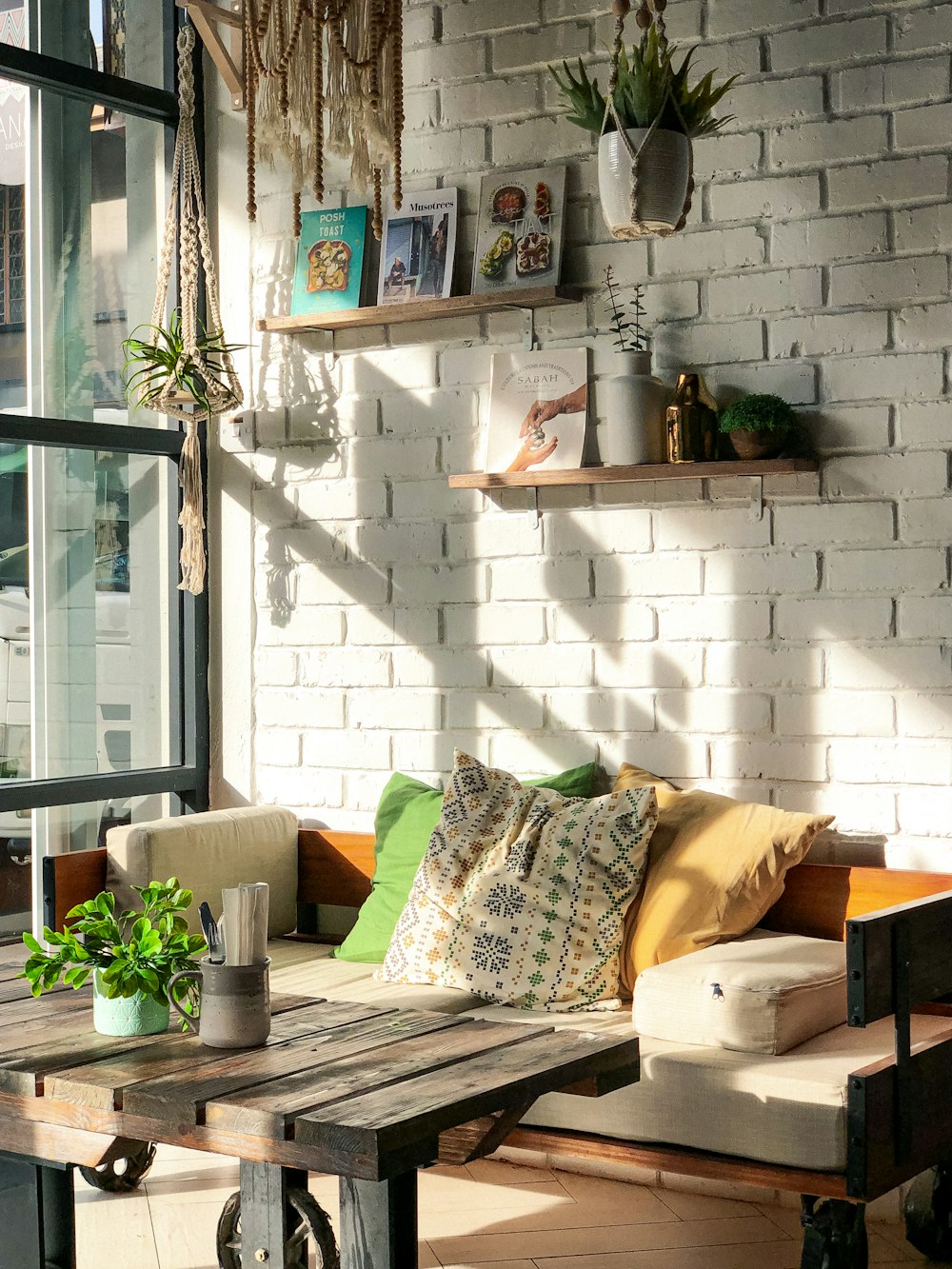 a living room with a couch and a table