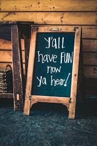 y'all have fun now ya hear! singed chalkboard