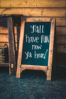 y'all have fun now ya hear! singed chalkboard