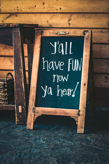 y'all have fun now ya hear! singed chalkboard