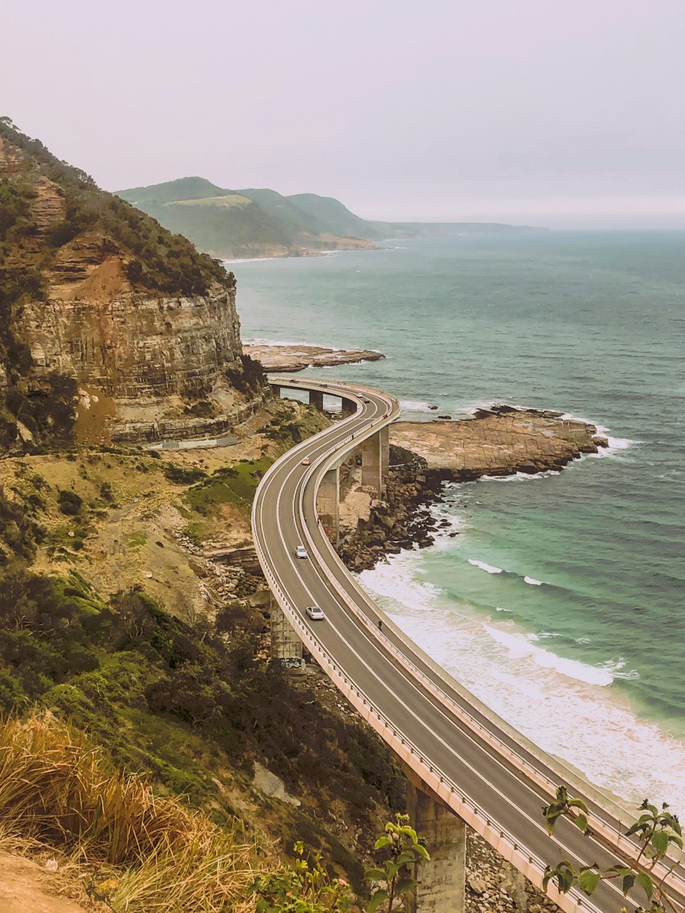 bird's-eye view photo of street near the sea