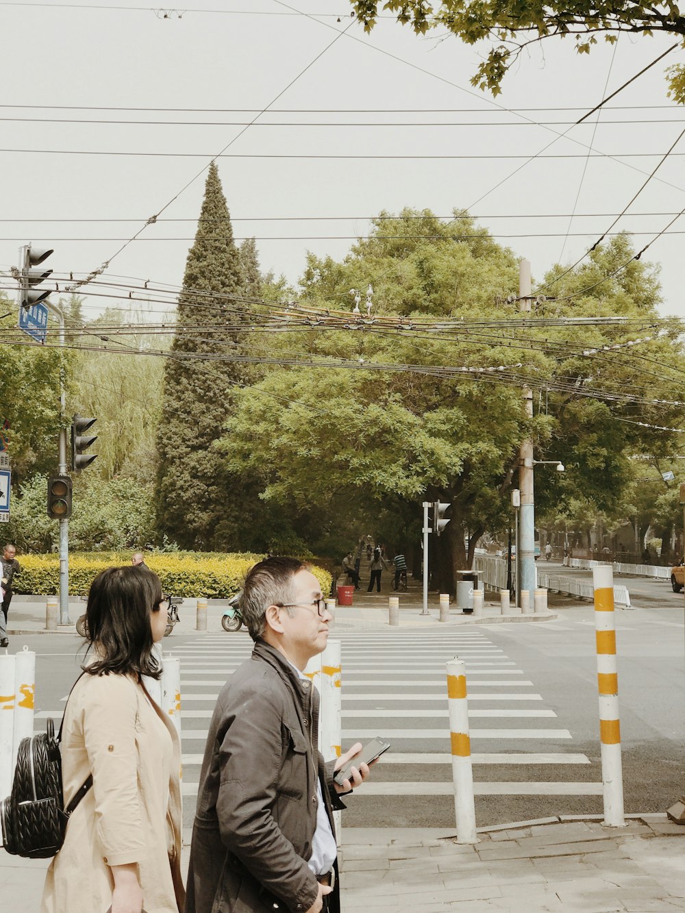 man and woman walking near outdoor during daytime