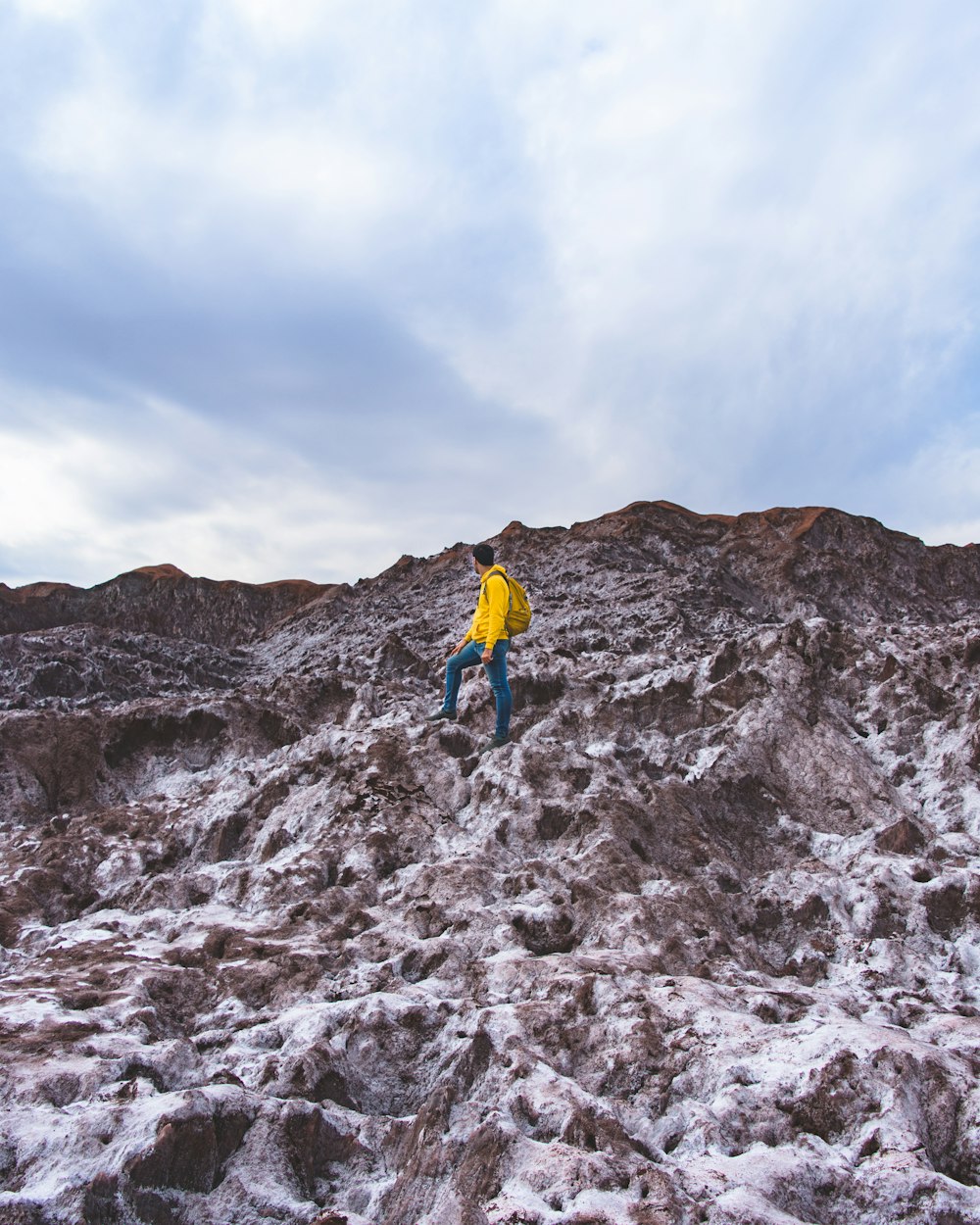 man standing on mountain